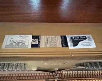 Crdentials inside Baldwin Piano.