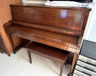 Baldwin Piano with beautiful wood and good tuning.