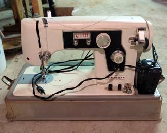 P.N. Hirsch Portable Electric Sewing Machine Centennial Series, Model 1610, With Foot Pedal, In Hard Sided Carry Case