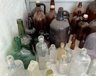 LOTS OF VINTAGE BOTTLES.
