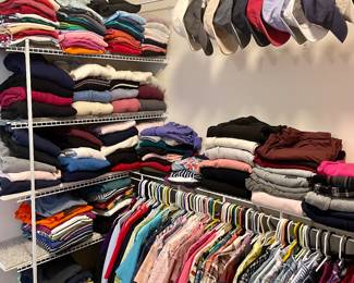 Large walk in closet Full of womens clothing.  Most sizing Large up to 2X, 14-18 