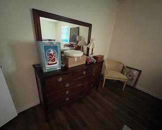 DIXIE mahogany bow front dresser with mirror.