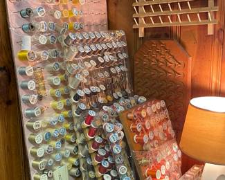 Large supply of spools of thread, including spool holder. 