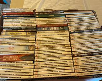 Collection of Louise L'Amour books.