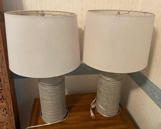 Set of two multicolored with cream color shade ceramic table lamps.