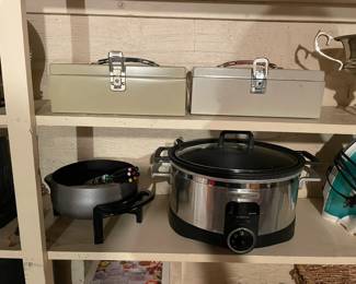 Metal boxes and kitchen appliances.
