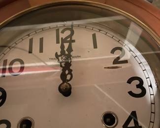Trademark wall clock.