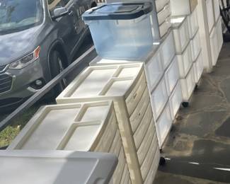 Large selection of plastic containers.