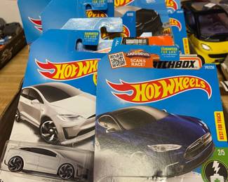 Assorted Hot Wheels in original blister packs.
