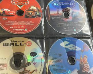 Folder with over 50 CDs.