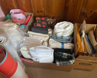 Assorted fabric and craft items.