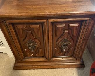Four-piece bedroom set - bedroom with mirror, armoire and two night stands.