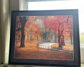 Framed print of fall scene.