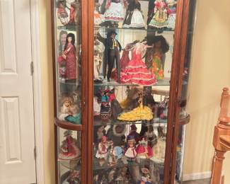 Dolls, curio cabinet