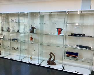 Glass display cabinets,  12 throughout the house