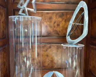 Metal sculptures, plexiglass pedestals