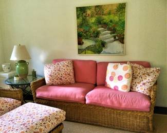 A Charming  Sunroon Full of Wicker and Wrought Iron