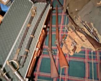 2 CS swords, 3 Cav. Sabers, Richmond musket, pistals and knives.