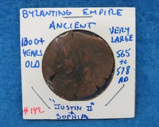 Lot 91. Seller Description:   Byzantine Empire 565t. 578 AD coin. "Justin II and Sophie"