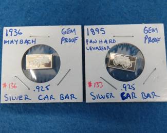Lot 76. Two .925 silver car bars