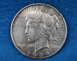 Lot 218. 1934 P Peace Silver Dollar
