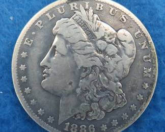 Lot 71. 1886 O Morgan Silver Dollar