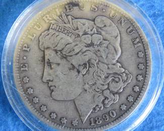 Lot 100. 1890 S Morgan Silver Dollar