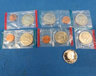 Lot 179. Kennedy half dollars as described:  1974 P and D 1976 P and D with a penny 1978 P and D with a penny
