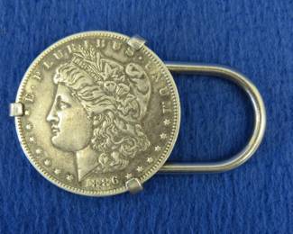 Lot 124. 1886 Morgan Silver dollar mounted on a key chain