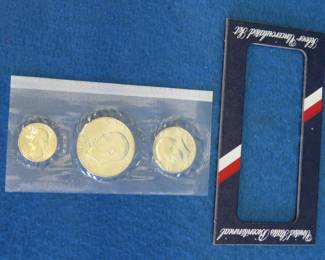 Lot 190. 1776-1976 Uncirculated Silver Dollar, Half Dollar Quarter