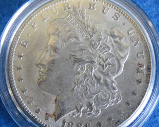 Lot 98. 1886 P Morgan Silver Dollar