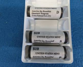 Lot 213. Three U.S. Mint rolls of 2014 America the Beautiful quarters