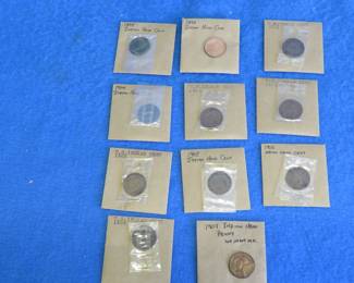 Lot 47. 14 Indianhead Pennies 1895-1908. See photos for dates
