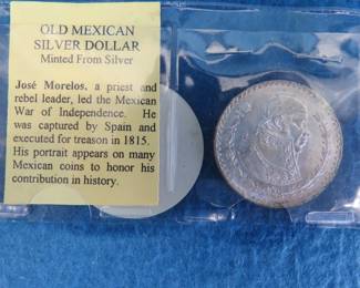 Lot 214. Old Mexican Silver Dollar