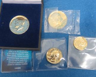 Lot 123. Four Gold-plated/colored coins