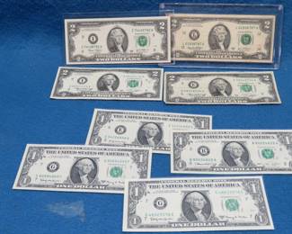 Lot 10. Four $2.00 and four $1.00 bills