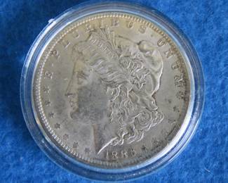Lot 61. 1886 P Morgan Silver Dollar