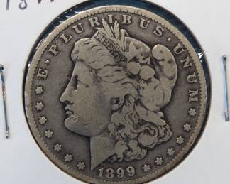 Lot 173. 1899 O Morgan silver dollar