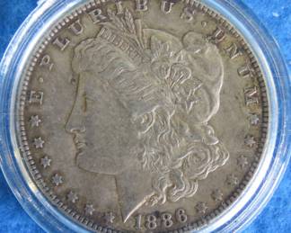 Lot 60. 1886 P Morgan Silver Dollar