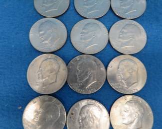Lot 65. 11 Eisenhower Bicentennial dollar coins and 3 Eisenhower dollars, 1971, 1972 and 1977