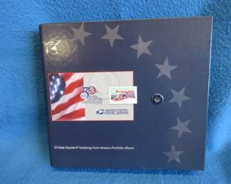 Lot 34. Unopened set of all 50 state quarters in a 3-ring folder sold by the U.S. Postal&nbsp; Service.