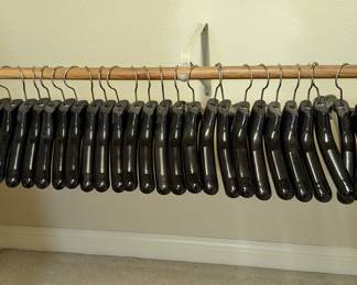 Lot #B69 - 58 Black Plastic Coat Hangers