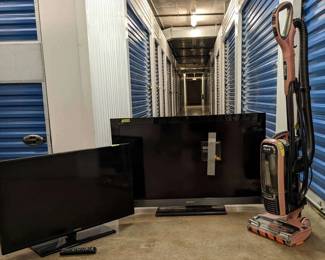 WST063 TV'S, Unused Framing Nails and a Shark Vacuum Cleaner.