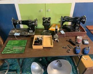 Vintage sewing machines and microscopes