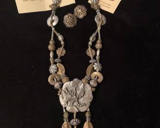 Mary & Doug Hancock/Mummy's Bundle silver and brass necklace and earring set, 1992