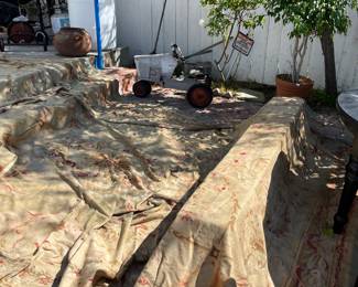 huge damaged Aubusson rug