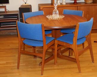Signed teak round table four chairs with leaf