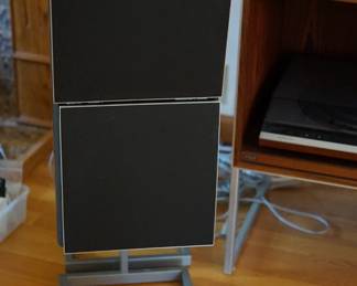 Set of four Bang and Olufsen speakers on stands 