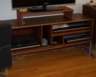 Bang and Olufsen stereo system with turntable and four speakers on stands. Complete to include Jacob Jensen stand. Selling on silent bid to highest bidder. working unit. 