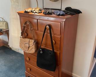Tall dresser and vintage Coach purses 